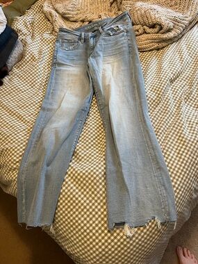 American Eagle Outfitters Light Blue Flared Kick out crop Jeans with Frayed Hem